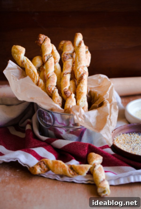 Everything Bagel Cheese Twists. These delicious pastries can be prepared in less than 30 minutes! #abeautifulplate #everythingbagel #pastry #recipe #brunch Everything Bagel Cheese Twists