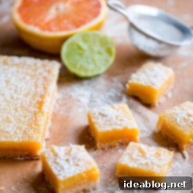 Bright Citrus Coconut Shortbread 9 Four Citrus Coconut Shortbread Bars on a plate, ready to be enjoyed