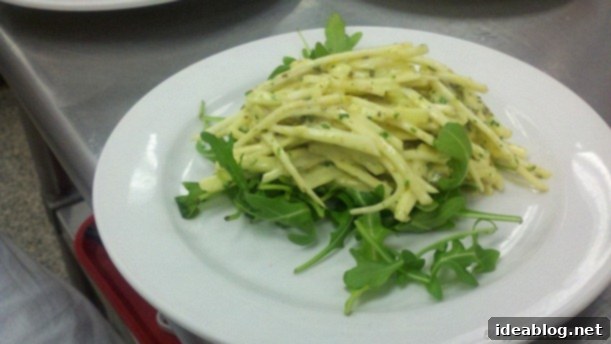Fifth Day's Creation: Potage Julienne Darblay and Orange Zest Confit 4 Celery root and apple salad with remoulade on arugula