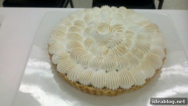 Fifth Day's Creation: Potage Julienne Darblay and Orange Zest Confit 7 Slice of lemon meringue tart with fluffy meringue