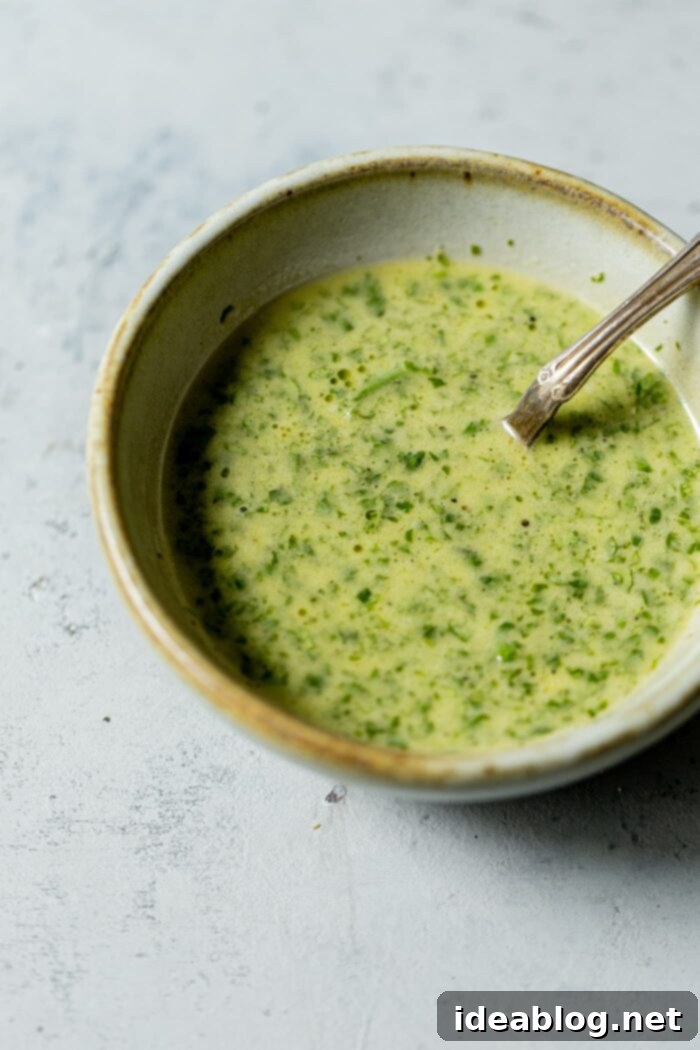 Fire-Kissed Green Beans with Zesty Cilantro Dressing 7 Small bowl of vibrant green cilantro lime vinaigrette.