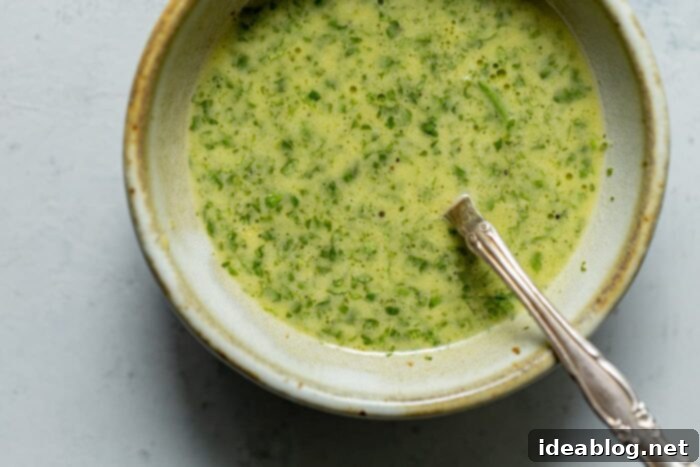 Fire-Kissed Green Beans with Zesty Cilantro Dressing 9 Small bowl of freshly made cilantro lime vinaigrette, ready to be used.