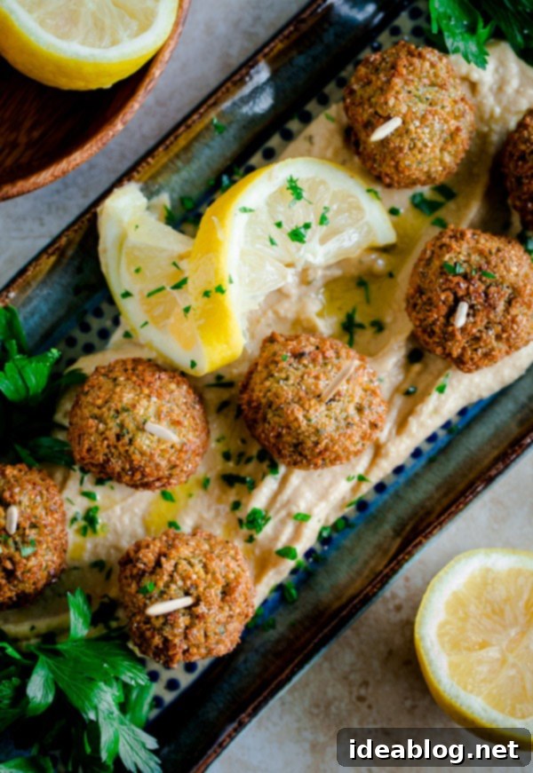 Golden Falafel Bites with Zesty Lemon Hummus 5 Mini Falafel Bites with Hummus