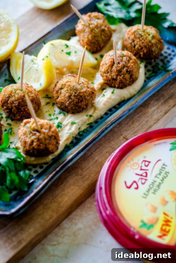 Golden Falafel Bites with Zesty Lemon Hummus 7 Mini Falafel Bites with Hummus