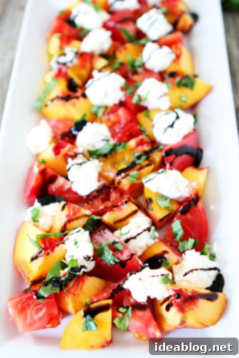 Summer Burrata Delights: 12 Irresistible Recipes 7 Tomato, Peach, and Burrata Salad