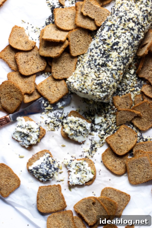 9 Everything Bagel Recipes to Obsess Over 3 Creamy Everything Bagel Goat Cheese log on a serving board