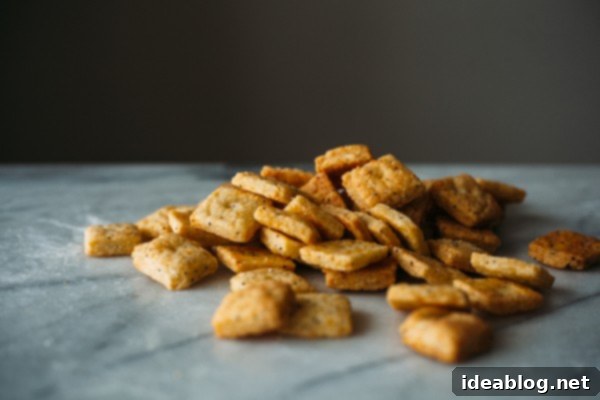 9 Everything Bagel Recipes to Obsess Over 5 Crispy Everything Bagel Cheeze-Its on a baking sheet