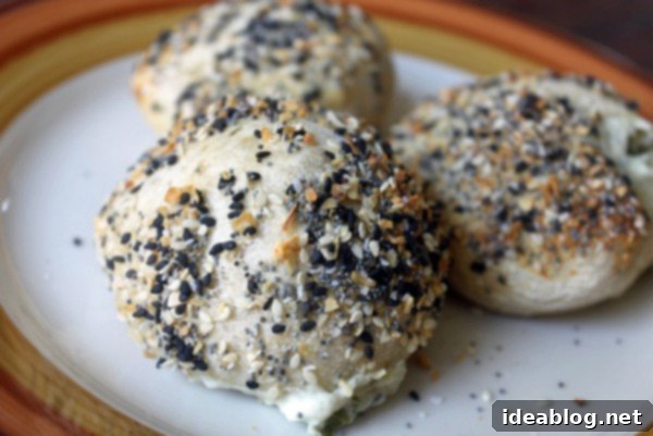 9 Everything Bagel Recipes to Obsess Over 7 Several Everything Bagel Bombs with melted cheese peeking out