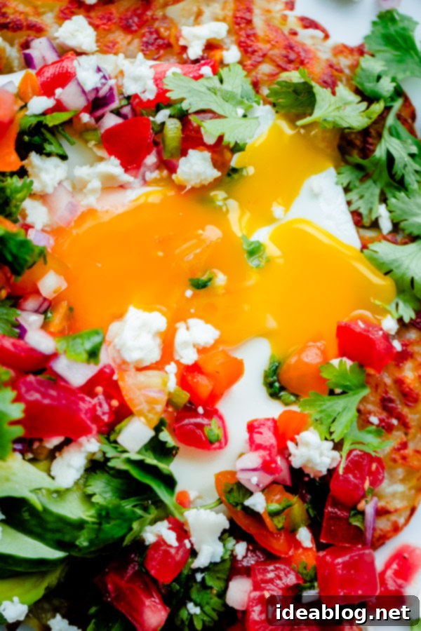 Loaded Fiesta Hash Browns 5 Mexican Hash Brown Stack. Crispy potato topped with sunny-side eggs, sliced avocado, homemade pico de gallo, and crumbled queso fresco cheese!