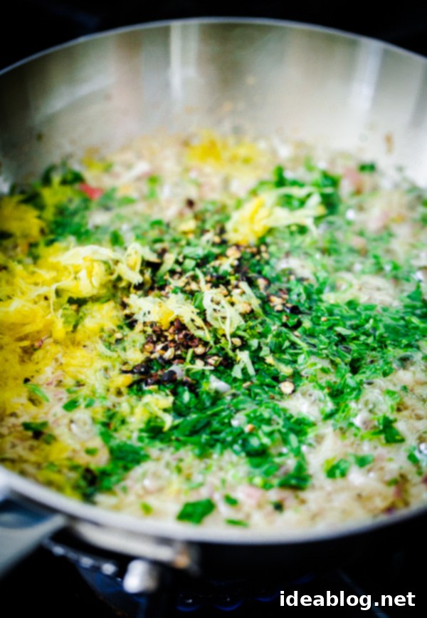 The aromatic Tarragon Shallot Butter simmering in a small pan, infusing with flavors Tarragon Shallot Butter being prepared in a sauté pan