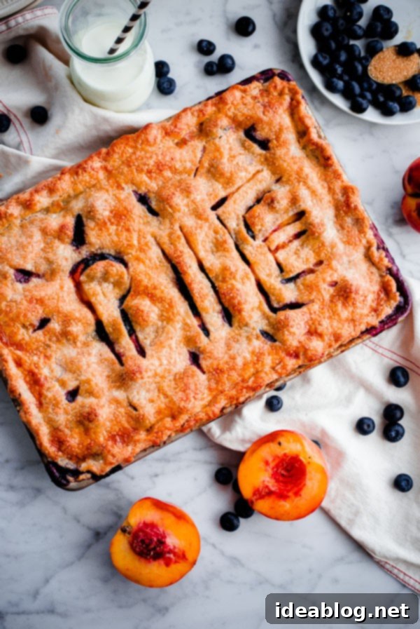 Golden Peach & Blueberry Slab Bake 6 Flaky crust of Blueberry Peach Slab Pie