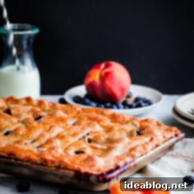 Golden Peach & Blueberry Slab Bake 7 Blueberry Peach Slab Pie. The ultimate summer dessert!