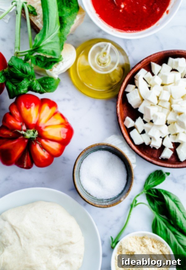 The BEST Homemade Margherita Pizza. Made in a standard kitchen oven! #pizza #margherita #abeautifulplate #recipe #italian Homemade Margherita Pizza Ingredients fresh basil mozzarella tomatoes