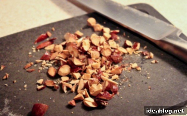 Harvest Pumpkin Coconut Swirl with Maple Almond Crumble 3 Close-up of golden brown Maple Almond Crunch pieces, ready to be added as a topping.