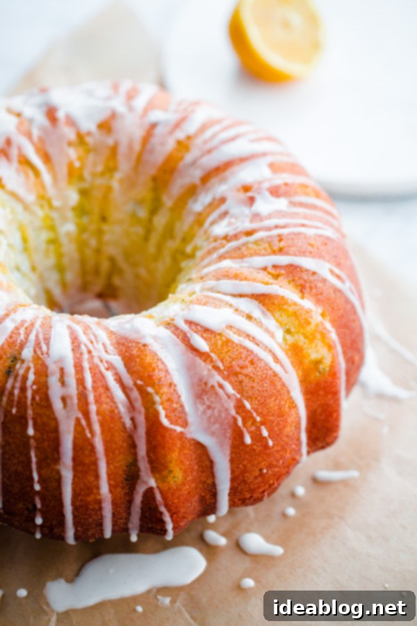 Cardamom Zucchini Bundt with Zesty Lemon Drizzle 6 Freshly baked Zucchini Cardamom Bundt Cake, beautifully glazed and ready for serving.