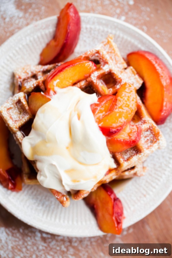 Golden Belgian Waffles with Sun-Kissed Peaches & Vanilla Cloud 2 Fluffy Belgian Buttermilk Waffles with Maple Roasted Peaches and Creamy Vanilla Mascarpone, a perfect summer breakfast or brunch