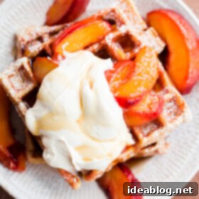 Golden Belgian Waffles with Sun-Kissed Peaches & Vanilla Cloud 8 Belgian Buttermilk Waffles with Maple Roasted Peaches and Vanilla Mascarpone
