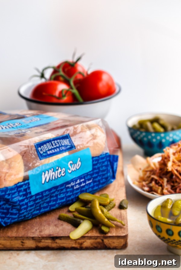 Chicago Hot Dogs Reinvented 3 Fancy Chicago-Style Hot Dogs topped with celery salt fried onions, Dijon mustard, cornichon, spicy sport peppers, and chopped tomato! Insanely delicious and easy tailgating food.