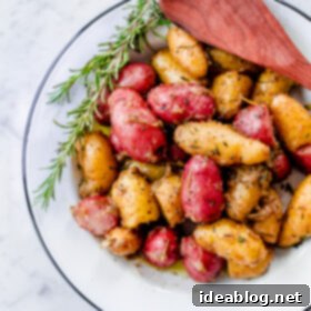 Garlic Herb Braised Fingerling Potatoes 2 Braised Fingerling Potatoes finished with fresh herbs