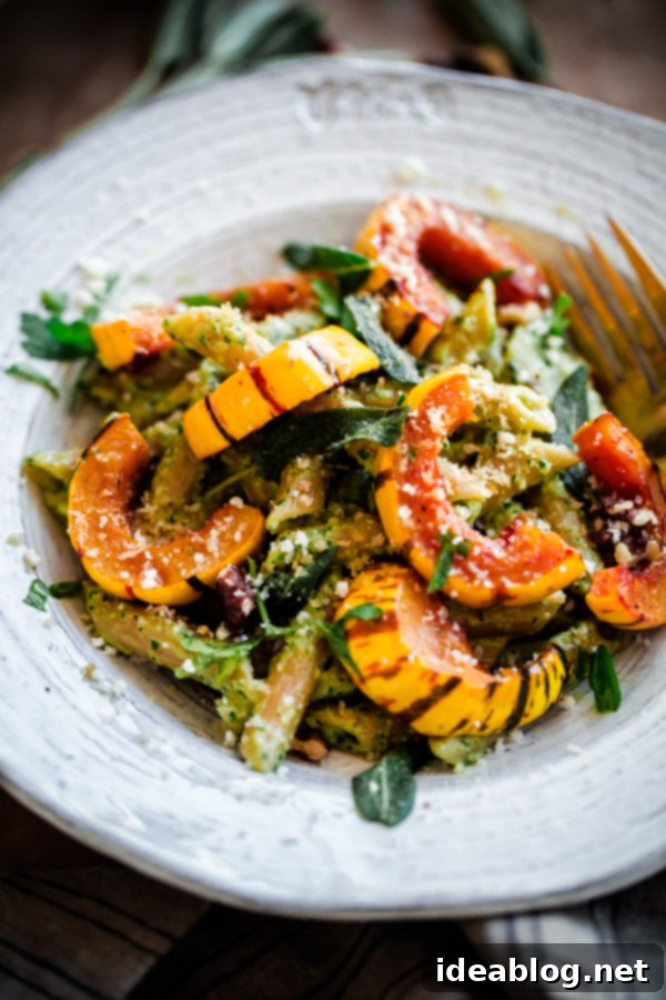 Sumptuous Whole Wheat Pasta with Gourmet Walnut-Sage Pesto and Roasted Delicata Squash. A delightful, nutritious, and simple vegetarian fall recipe!