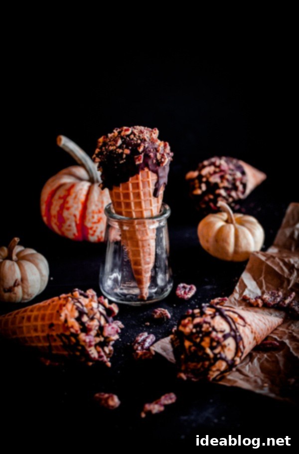 Spiced Pumpkin Drumsticks with Chocolate Pecan Crunch 3 Pumpkin Ice Cream Drumsticks with Chocolate and Candied Pecans