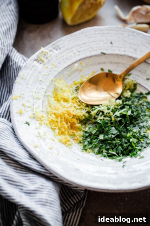 Homemade Chermoula: The Secret to Flavorful Broiled Salmon Fresh Herbs and Lemon Zest in a Bowl, Key Ingredients for Chermoula