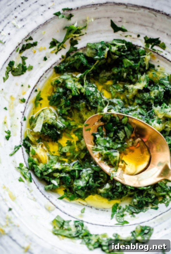 Fresh Chermoula: Olive Oil Infused Herbs and Citrus Close-up of Chermoula Herb Paste with Olive Oil