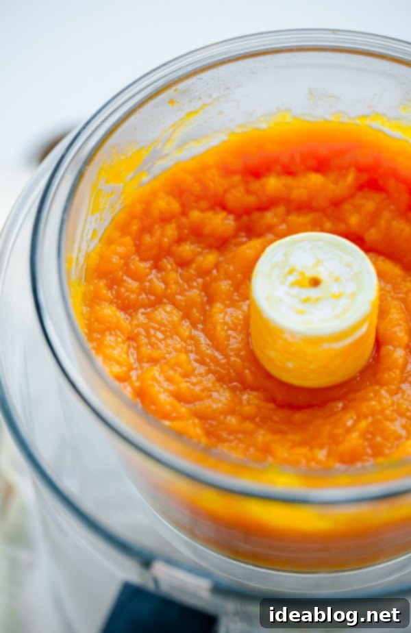 Homemade Pumpkin Puree. An easy tutorial for how to make pumpkin puree from scratch using sugar pumpkins! Homemade Roasted Pumpkin Puree