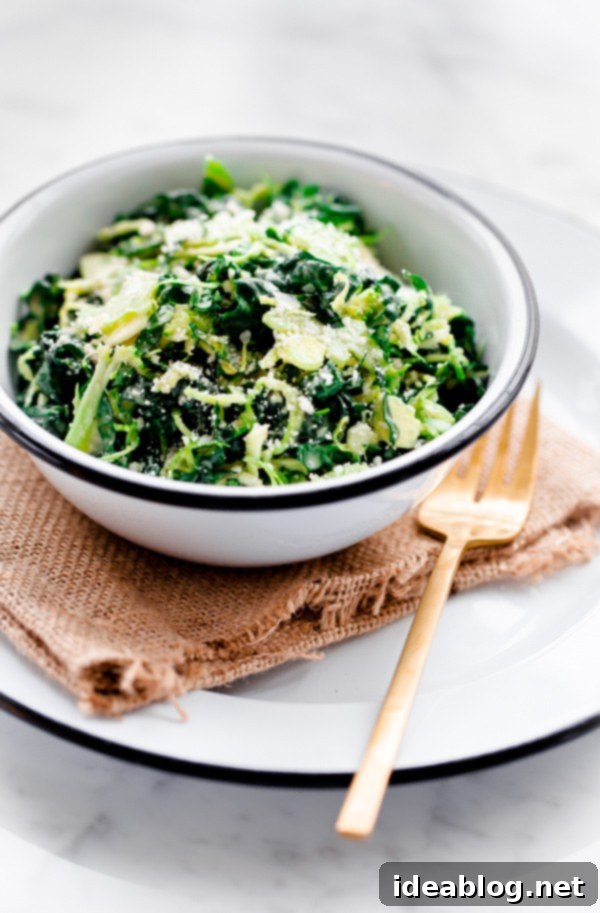 Truffle Parmesan Shaved Greens Salad 5 Close-up of Shaved Broccoli, Brussels Sprouts, and Kale Salad dressed with creamy sauce