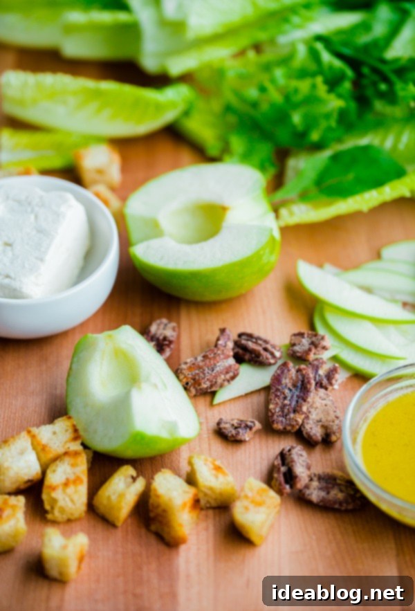 Sweet and Savory Apple Feta Pecan Salad with Sourdough Croutons 3 Ingredients for Apple Gem Lettuce Pecan Salad including apples, feta, candied pecans, and greens