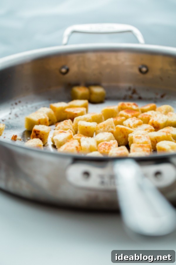 Sweet and Savory Apple Feta Pecan Salad with Sourdough Croutons 6 Perfectly golden homemade sourdough croutons in a bowl