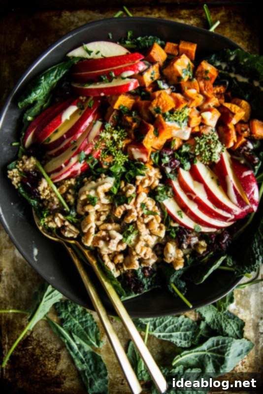 12 Soul-Satisfying Autumn Salads 4 Spiced Apple Cider and Sweet Potato Quinoa Bowl - a warm and beautiful fall salad, rich in flavor and nutrition.