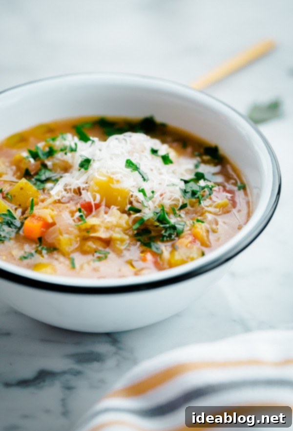 Wholesome and easy slow cooker winter vegetable soup with red lentils Close-up of hearty slow cooker vegetable soup simmering with vibrant ingredients