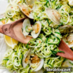 Garlic Clam Zucchini Spirals 2 Zucchini Linguini with Garlic Clam Sauce. An EASY, healthy dinner recipe made with zucchini noodles. Less than 250 calories per serving!