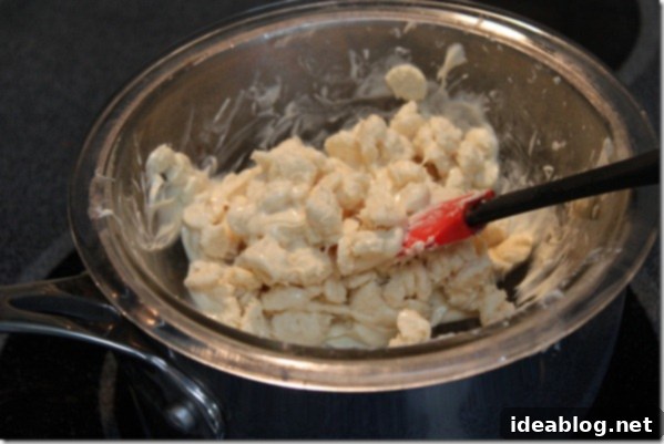 Irresistible Homemade Peppermint Bark 3 Melting White Chocolate Chips in a double boiler