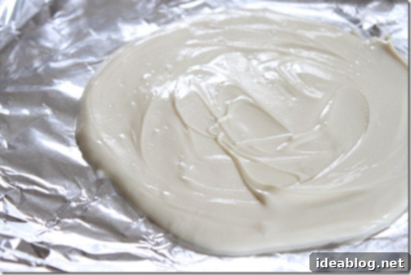 Irresistible Homemade Peppermint Bark 4 White Chocolate Spread on Foil