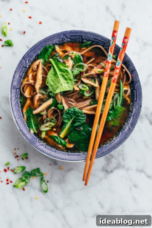 Easy Vegan Shiitake and Spinach Miso Soup Recipe A delicious bowl of vegan shiitake and spinach miso soup with soba noodles and fresh scallions.