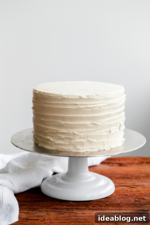 London Fog Dream Cake 5 A beautifully sliced London Fog Cake revealing its moist chocolate layers and the creamy, speckled Earl Grey buttercream.