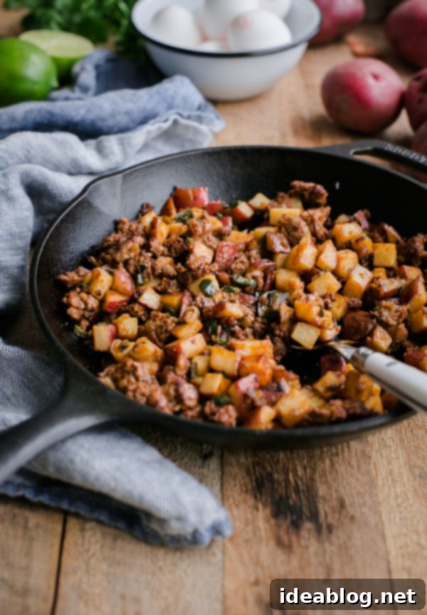Crispy Chorizo Hash Benedict with Zesty Cilantro Hollandaise 4 Chorizo Potato Hash in Skillet