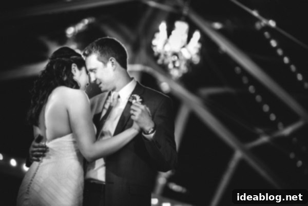 Our First Year of Marriage: 11 Superlative Moments 5 A cherished wedding photo of the couple dancing, capturing an intimate moment during their first dance.