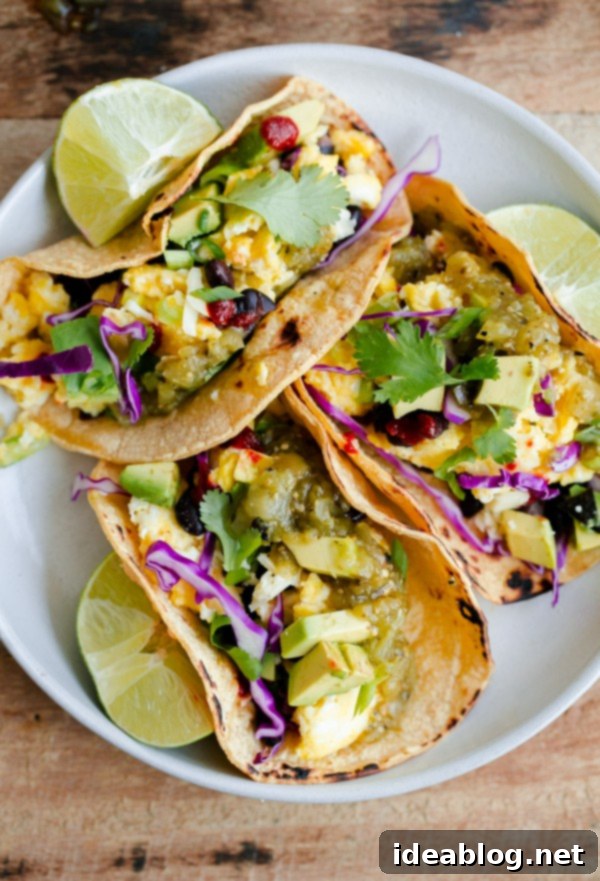 Sunrise Veggie Tacos 3 Assembled Vegetarian Breakfast Tacos with fresh ingredients, ready to eat