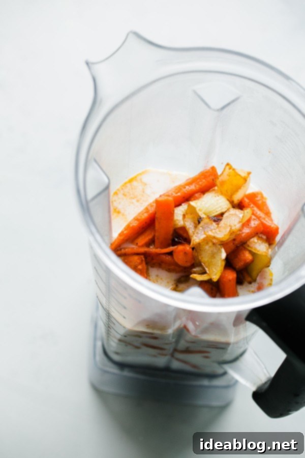 Vegan Garam Masala Carrot Soup. This easy, creamy soup comes together in less than 45 minutes, using just a sheet pan and blender. Vegan Garam Masala Carrot Soup Ingredients in Blender