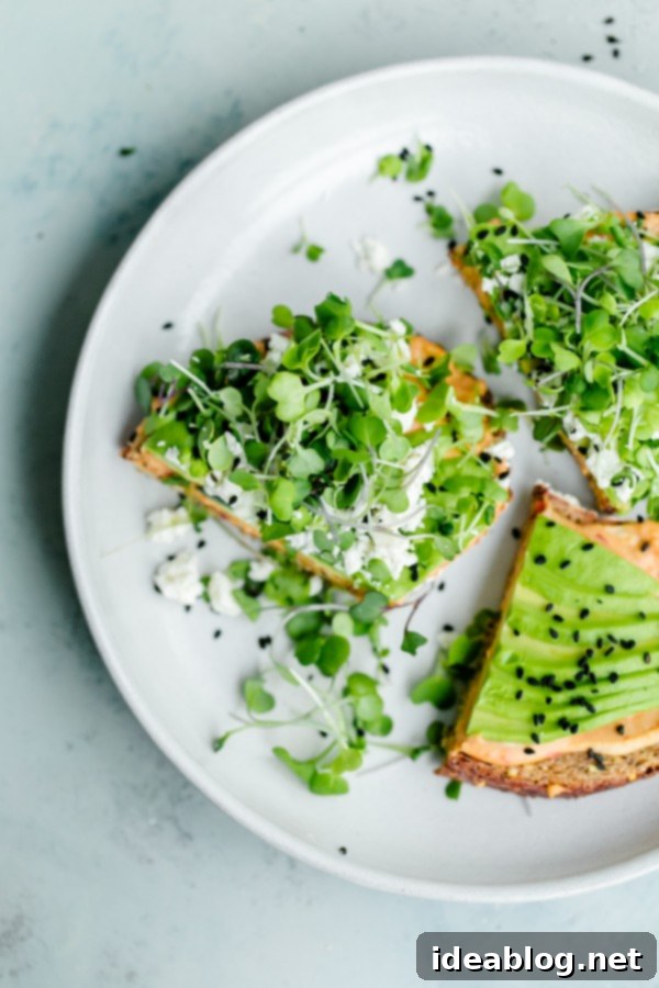 Spicy Hummus Avocado Toast with Feta. An easy vegetarian snack with a spicy kick! #abeautifulplate #vegetarian #feta #hummus #toast #recipe #avocado Spicy Hummus Toast with Avocado and feta, ready to eat