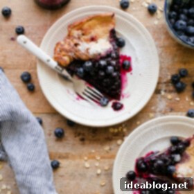 Puffed Gluten-Free Dutch Baby with Blueberry Maple Drizzle 2 Gluten-Free Dutch Baby with Homemade Blueberry Maple Syrup