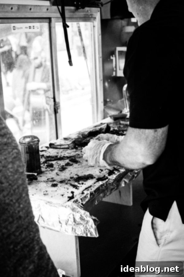 Corky's BBQ food truck, a mobile culinary delight, parked on a city street