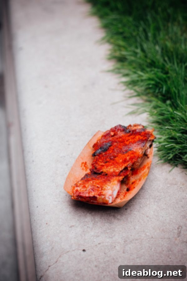 Close-up view of generously portioned Memphis Dry BBQ Ribs ready for eager customers