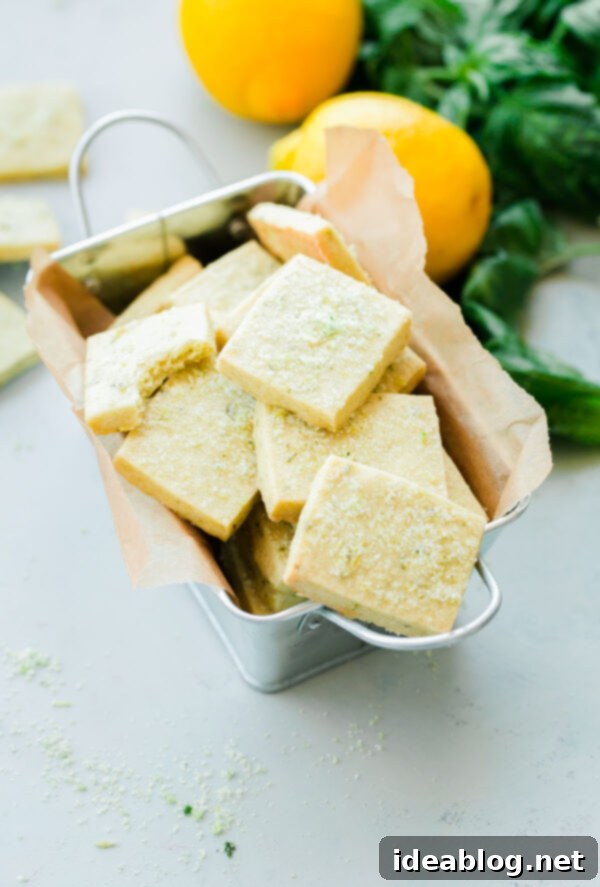 Lemon Basil Shortbread Cookies. Classic shortbread cookies infused with homemade lemon basil sugar!  Lemon Basil Shortbread Cookies – golden, crumbly cookies with a hint of green basil and lemon zest, perfect for summer