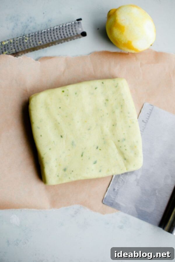 Lemon Basil Shortbread Cookies. Classic shortbread cookies infused with homemade lemon basil sugar!  Lemon Basil Shortbread Dough rolled and ready for cutting