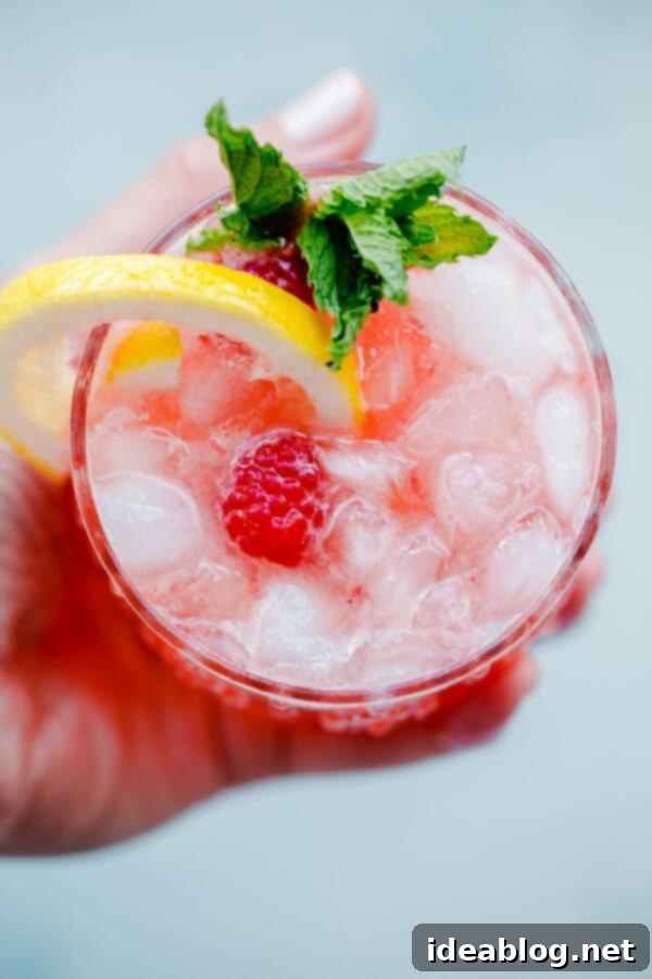 Kombucharita Punch. A refreshing summer cocktail made with kombucha! #kombucha #cocktail #punch #recipe #abeautifulplate Close-up of Refreshing Kombucharita Cocktail