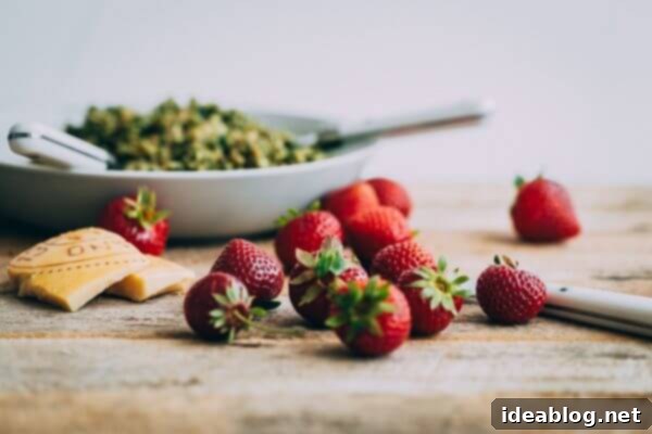 Strawberry Caprese Farro Salad. Hearty farro is tossed with homemade pesto, strawberries, tomatoes, and mozzarella cheese to create this beautiful summer grain salad! #salad #abeautifulplate #recipe #farro #caprese #mozzarella Summer Strawberries